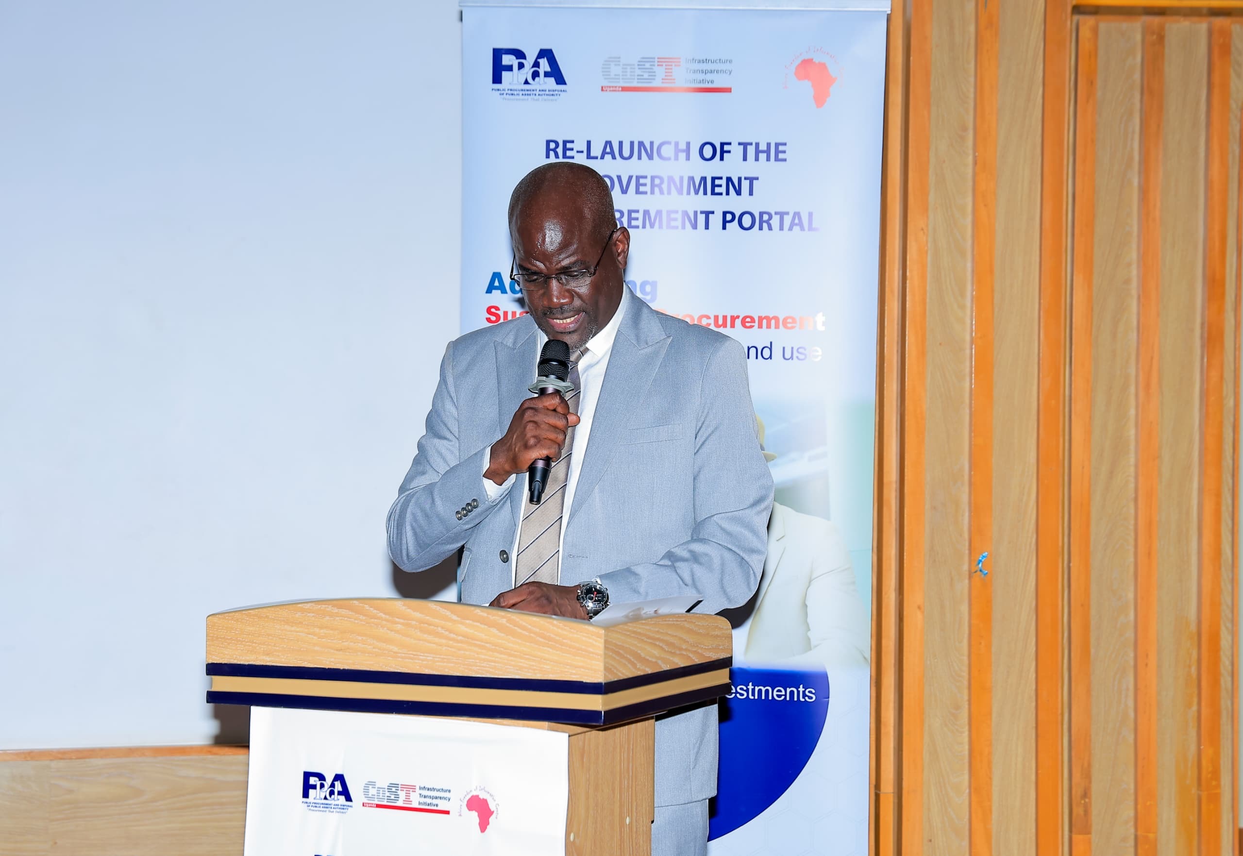 A speaker addresses the June 2026 relaunch of Uganda's Government Procurement Portal at the PPDA offices in Kampala.